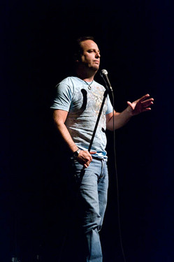 Me performing at the Calgary Funnyfest in May, 2009